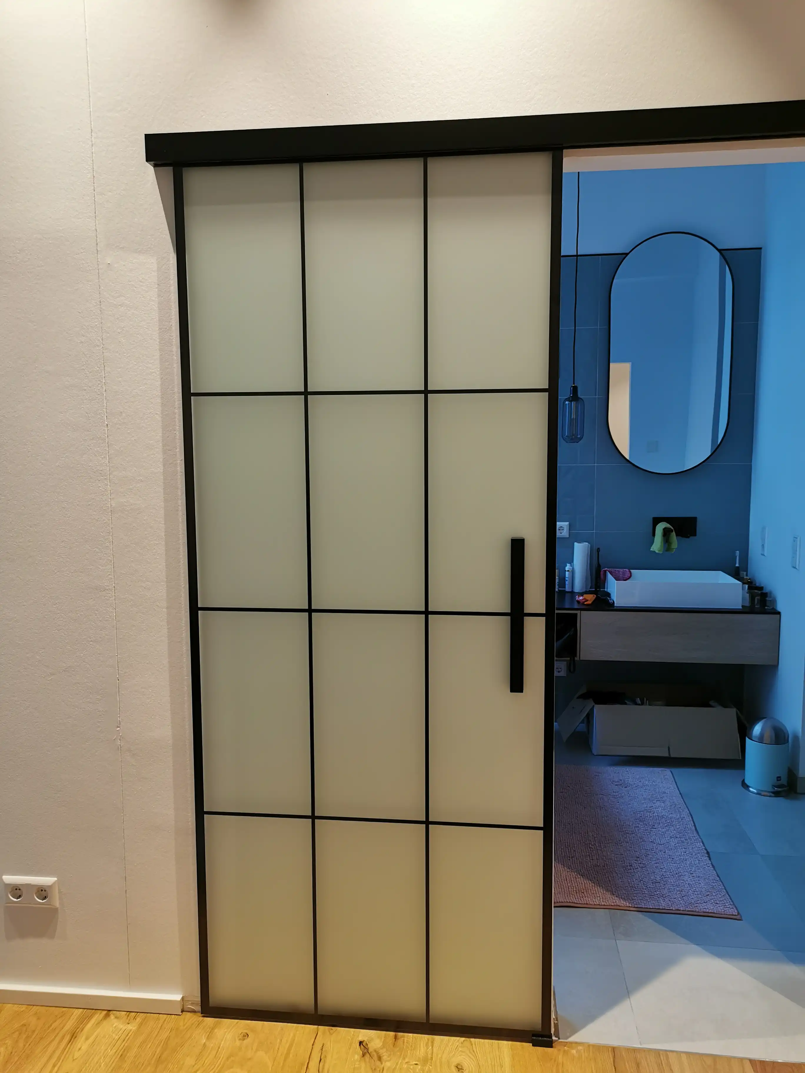 Glasschiebetüre im Loftdesign